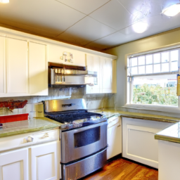A modern kitchen with freshly painted cabinets and a new backsplash.