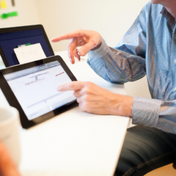A project manager reviewing change order documents on a digital platform.