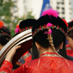 A vibrant festival in Chunian with people dancing and traditional music playing.